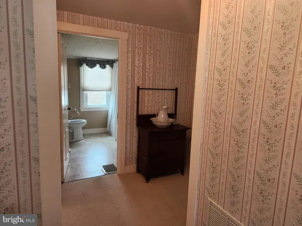 a room with furniture and a window