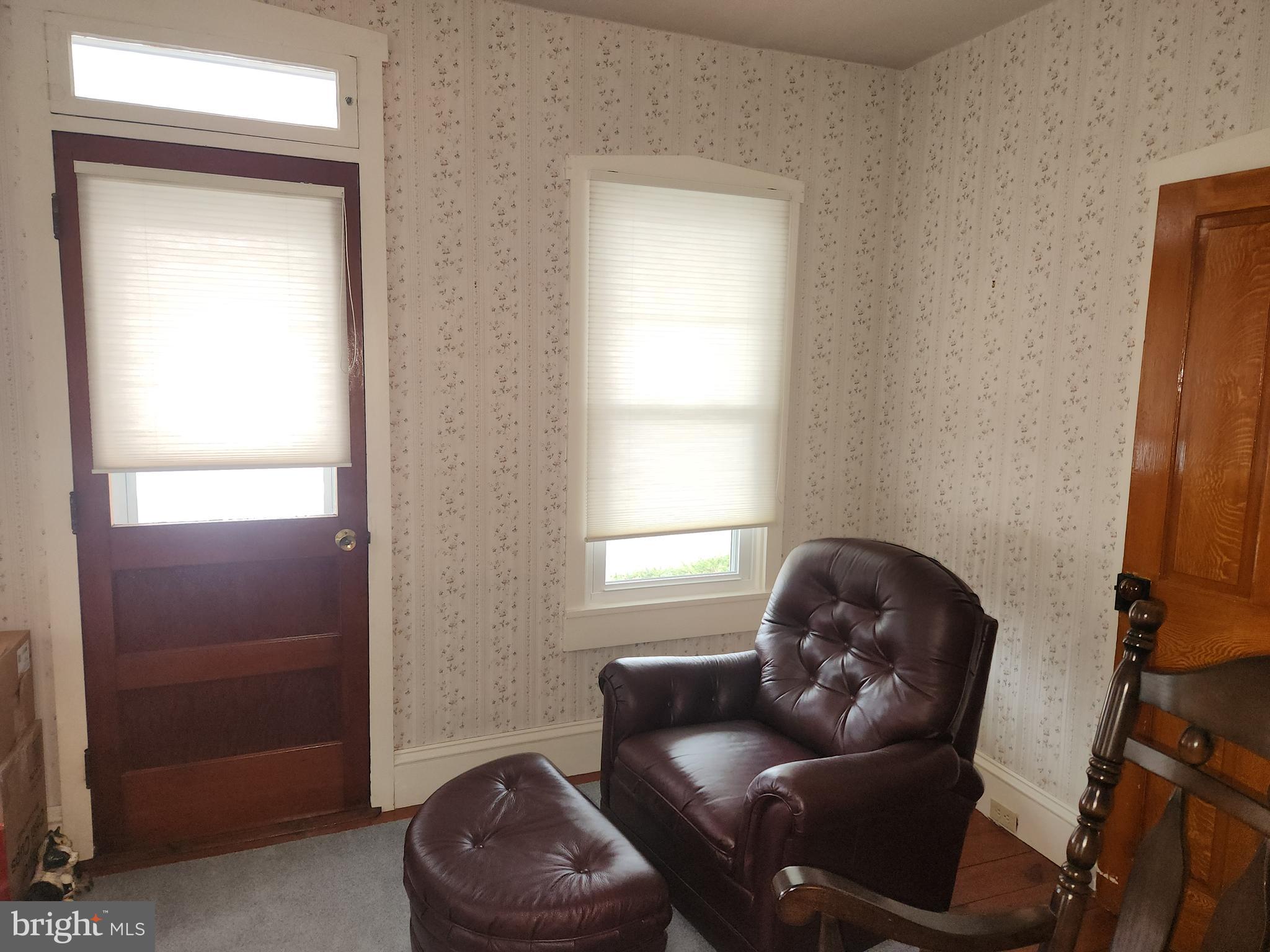 123 North 11th Street Akron, PA 17501 - Photo 33 of 43 a living room with furniture and a window