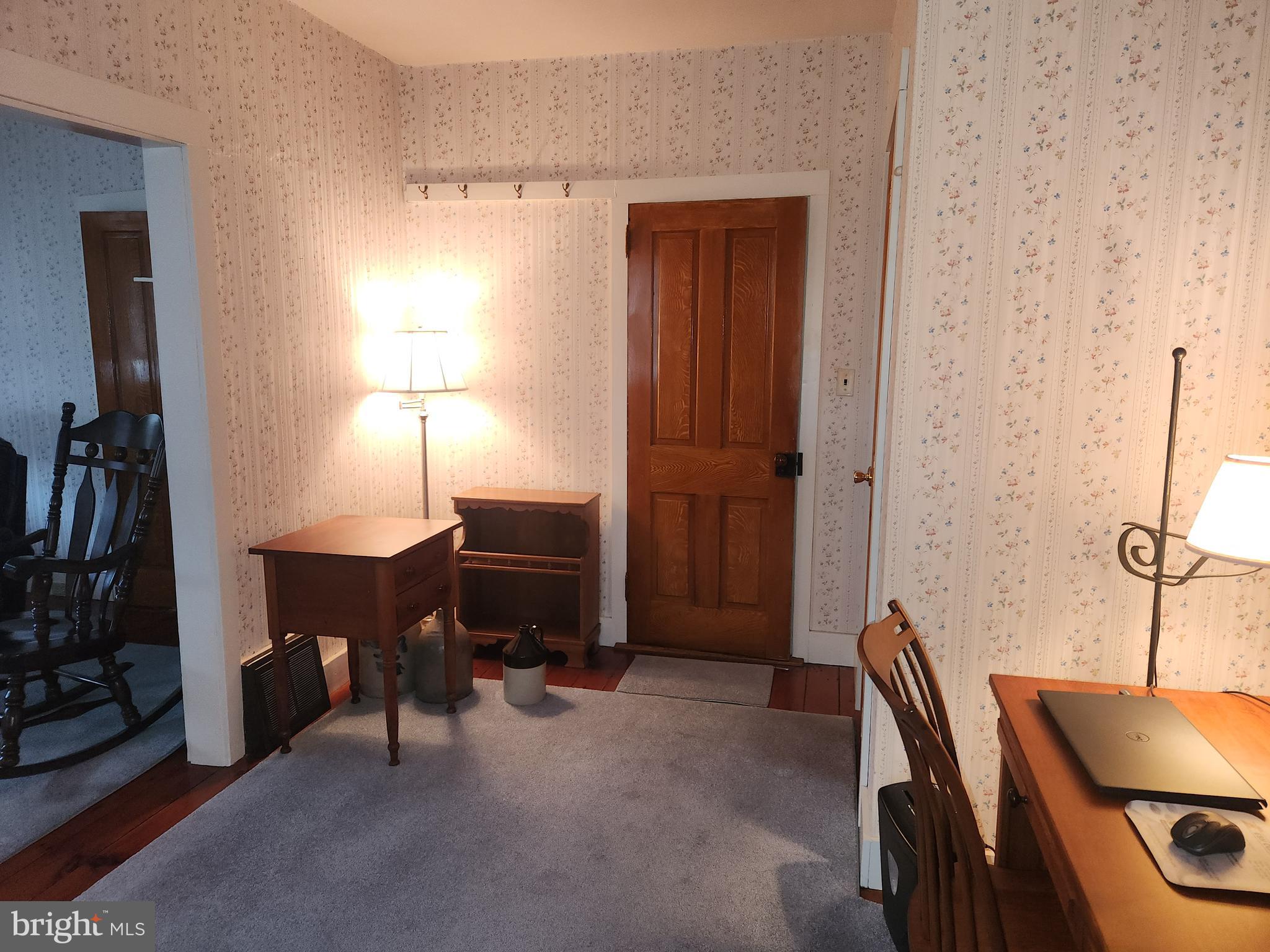 123 North 11th Street Akron, PA 17501 - Photo 35 of 43 a view of a workspace with furniture and a lamp