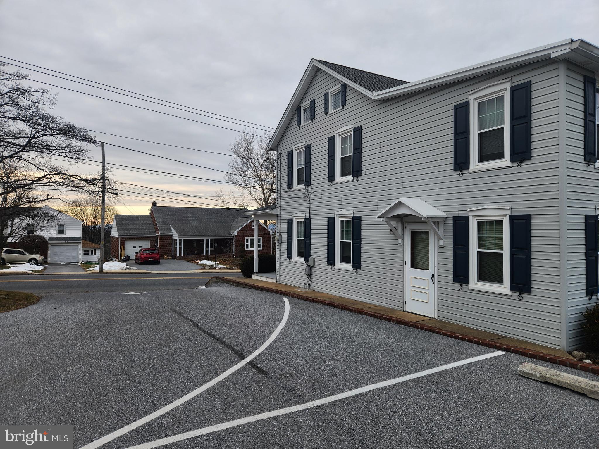 123 North 11th Street Akron, PA 17501 - Photo 5 of 43 a view of a building with car parked