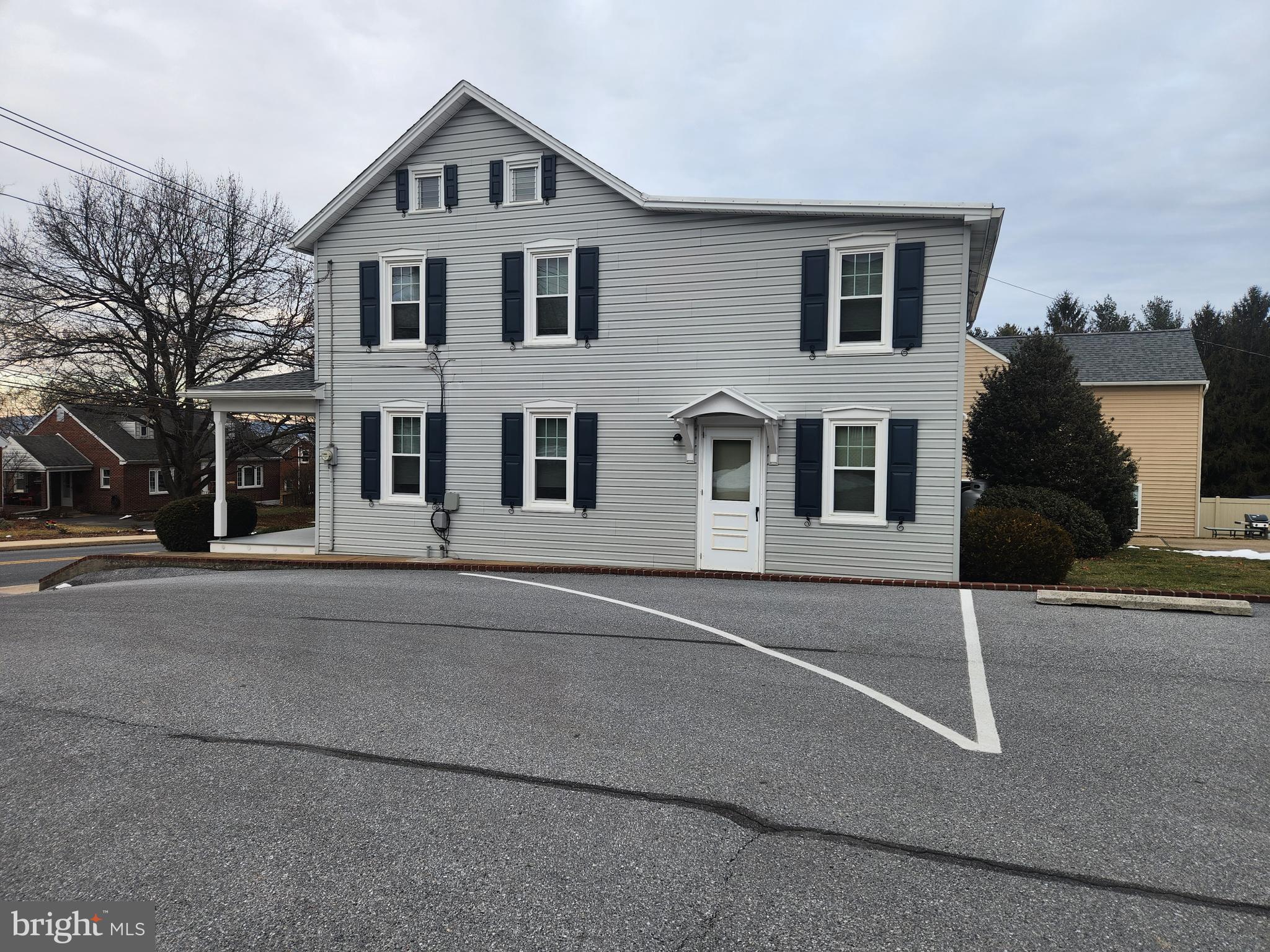 123 North 11th Street Akron, PA 17501 - Photo 6 of 43 a big house with a street