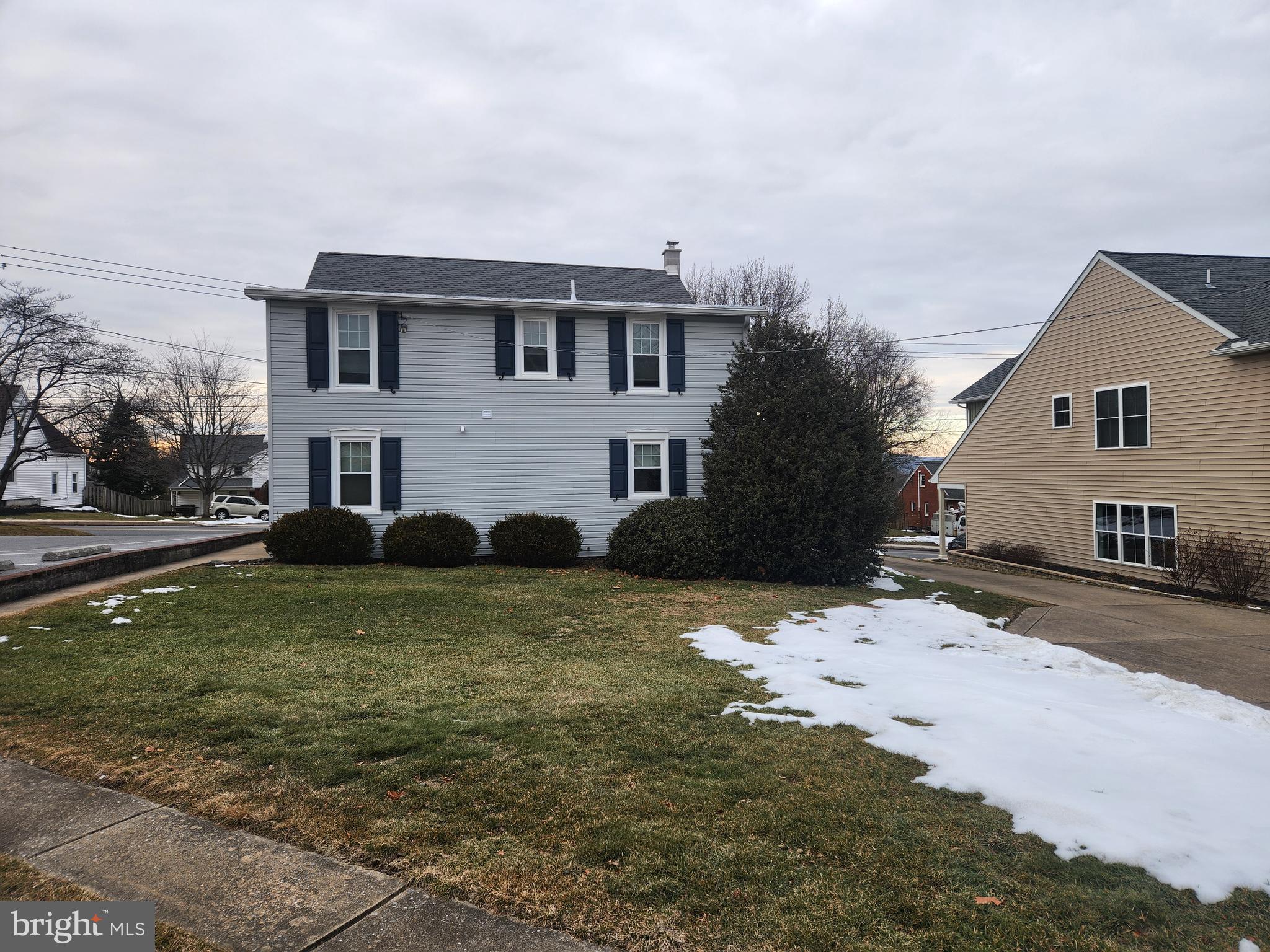 123 North 11th Street Akron, PA 17501 - Photo 7 of 43 a front view of a house with a yard