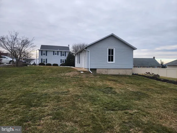 a view of backyard of house