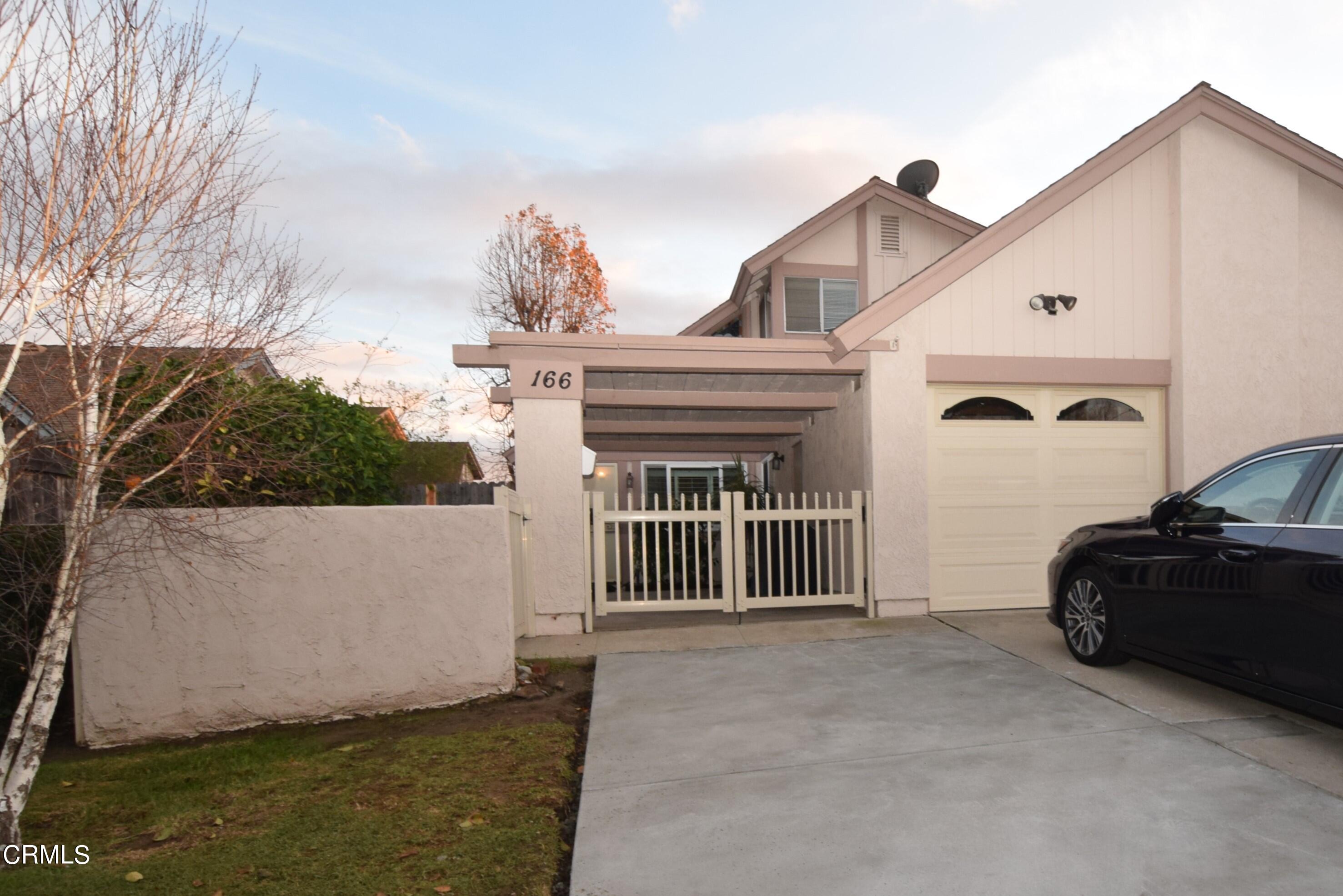 166 Ripley Street Camarillo, CA 93010 - Photo 1 of 28 a view of a house with backyard and porch