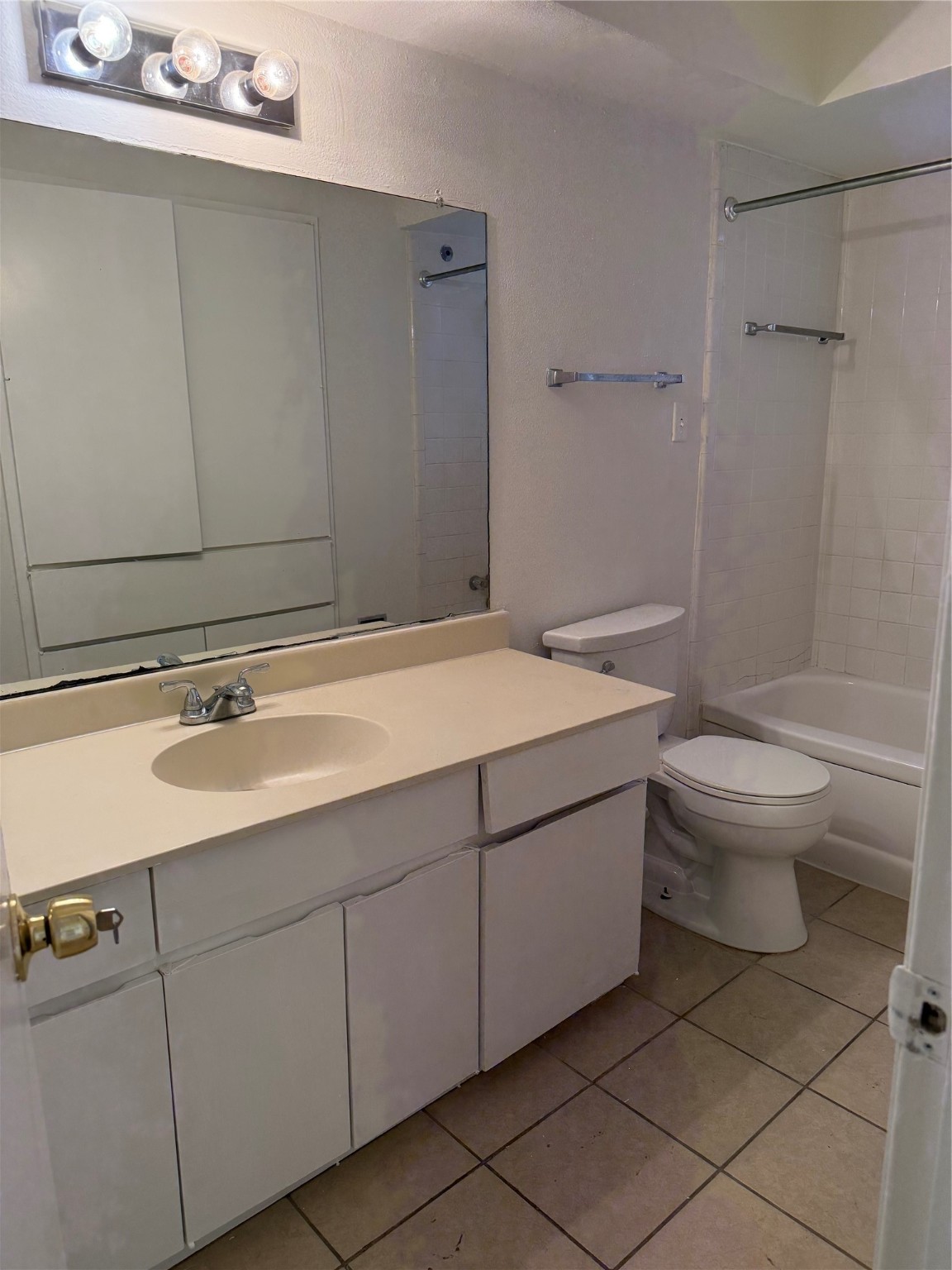 2605 Marilee Lane, Unit 2 Houston, TX 77057 - Photo 12 of 13 a bathroom with a sink a toilet and shower