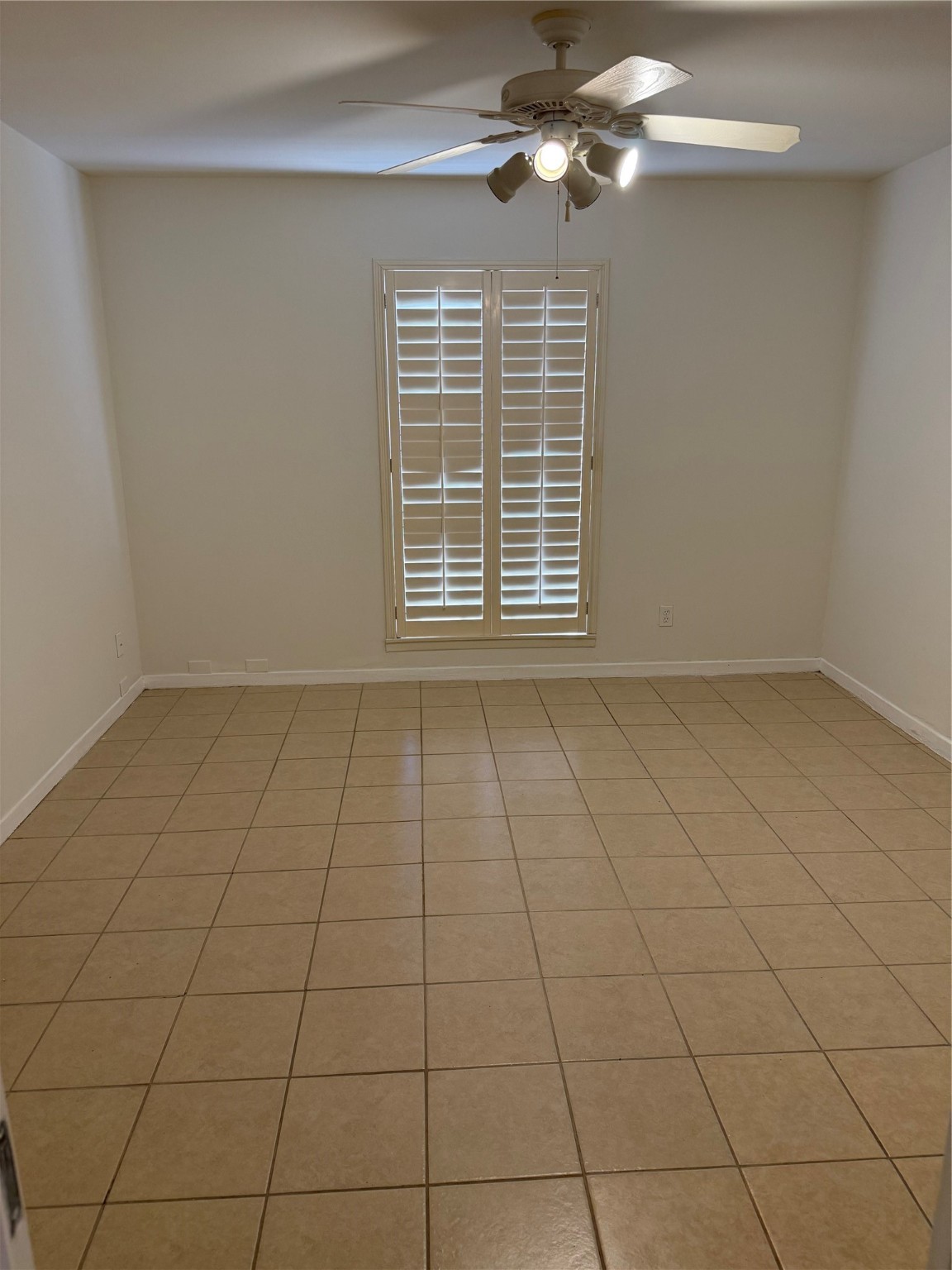 2605 Marilee Lane, Unit 2 Houston, TX 77057 - Photo 10 of 13 a view of an empty room with a window