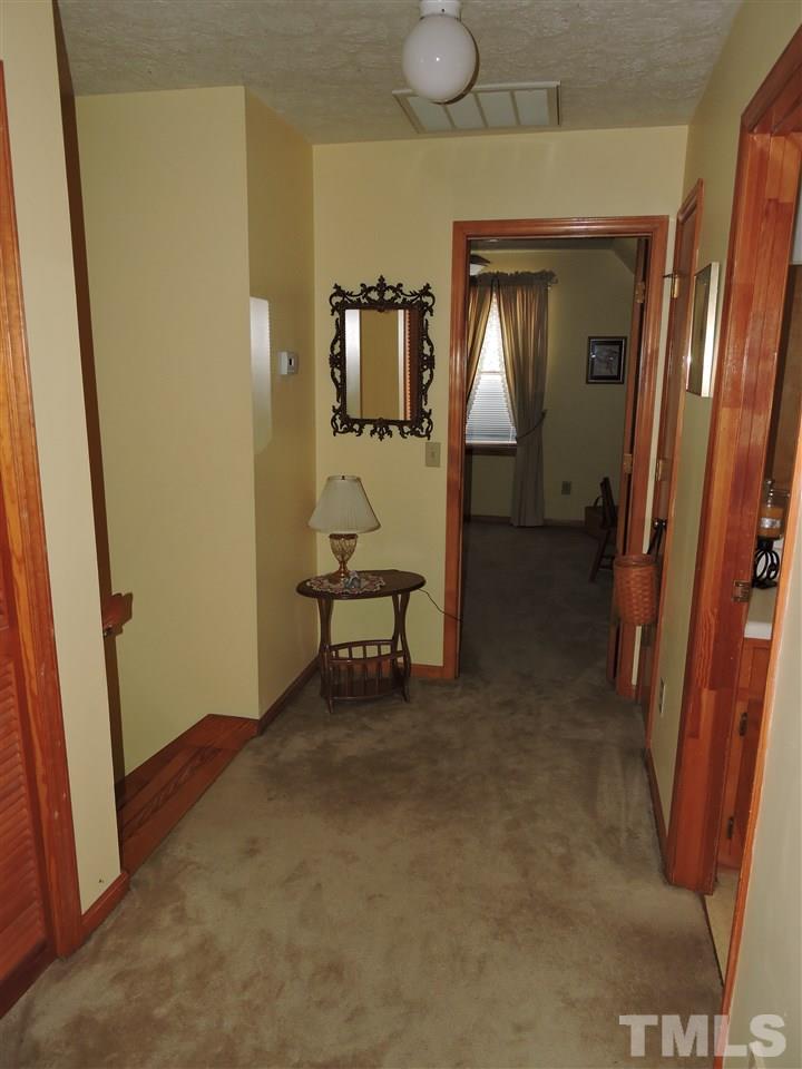 669 Ivey Day Road Roxboro, NC 27574 - Photo 22 of 24 a view of a livingroom with furniture and front door