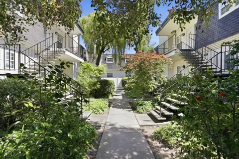 a view of a pathway with a house