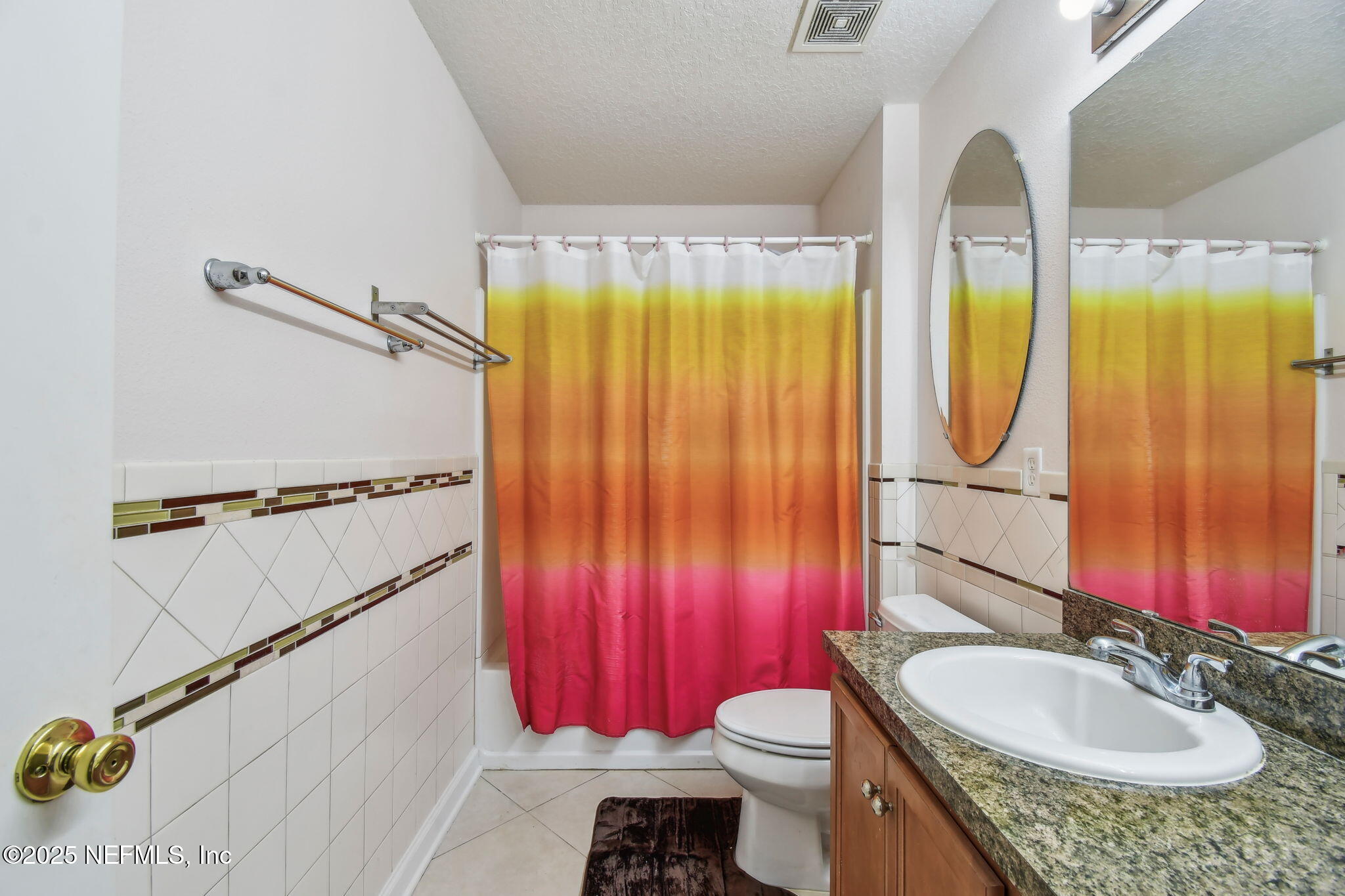 116 Nunna Rock Trail St. Augustine, FL 32092 - Photo 15 of 111 a bathroom with a granite countertop toilet sink and mirror