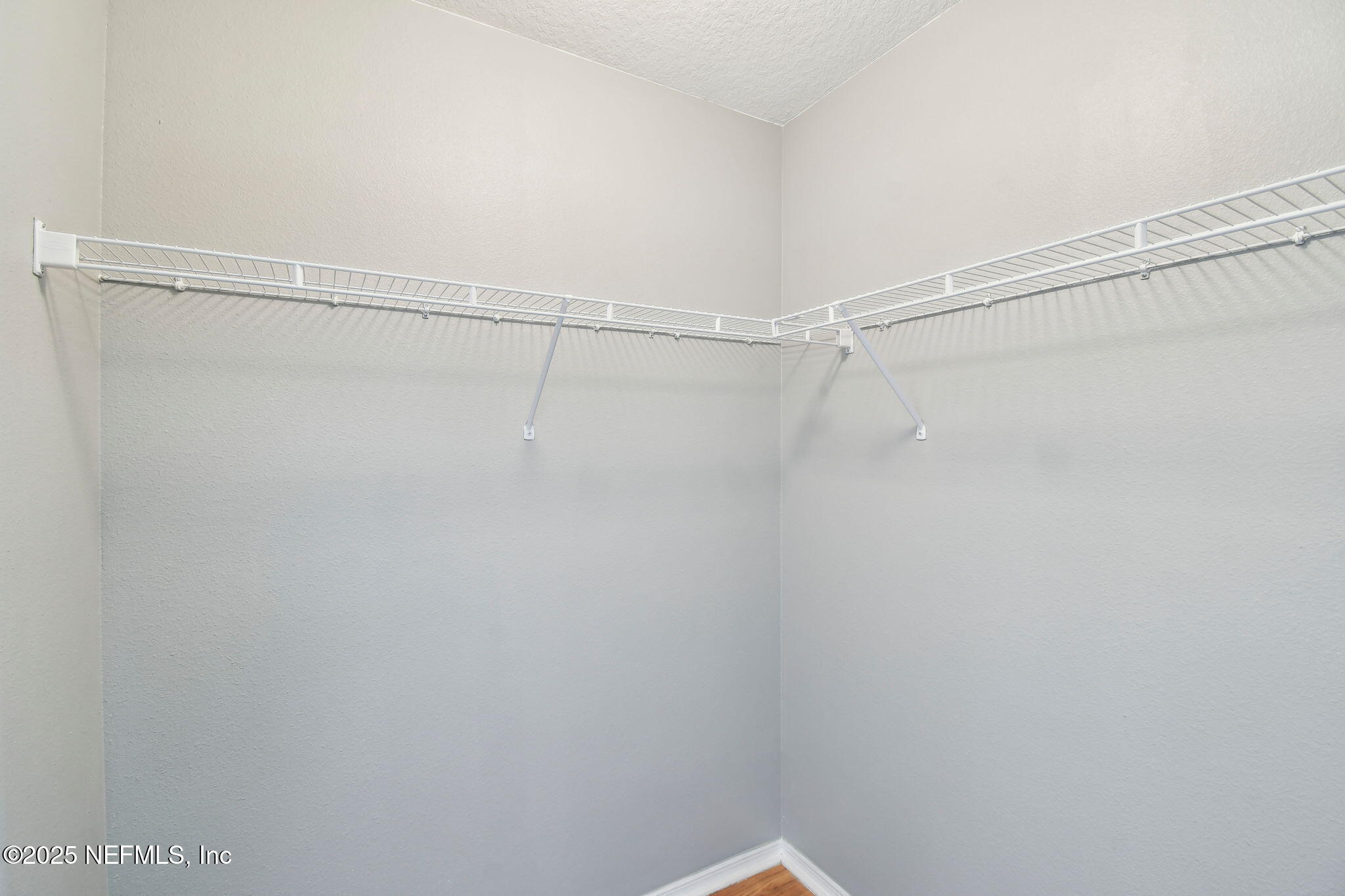 116 Nunna Rock Trail St. Augustine, FL 32092 - Photo 18 of 111 a view of a room with racks on the wall