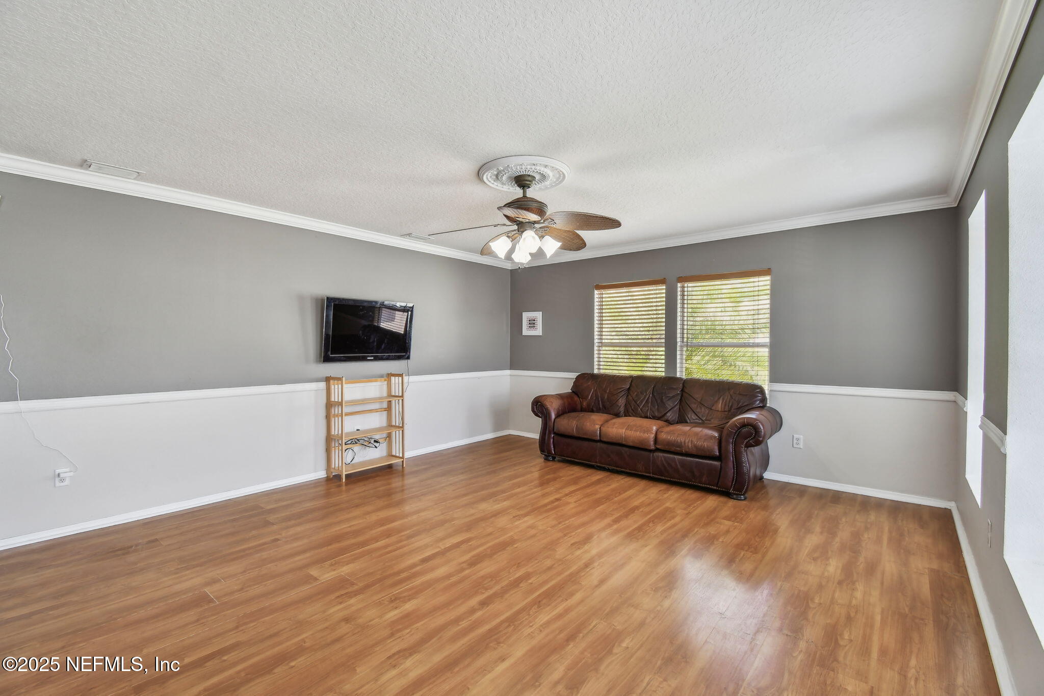 116 Nunna Rock Trail St. Augustine, FL 32092 - Photo 20 of 111 a living room with furniture and a flat screen tv
