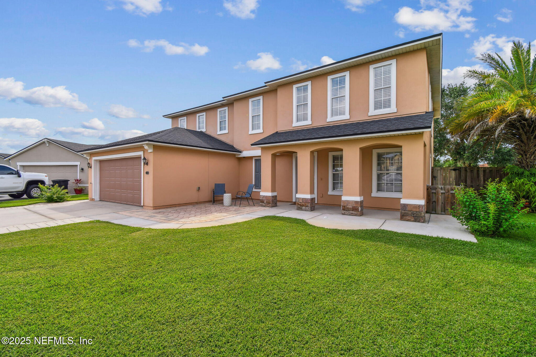 116 Nunna Rock Trail St. Augustine, FL 32092 - Photo 2 of 111 a view of a house with a yard porch and sitting area