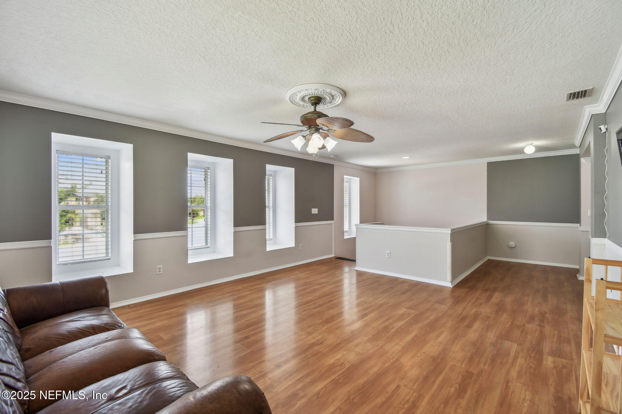 116 Nunna Rock Trail St. Augustine, FL 32092 - Photo 22 of 111 a living room with furniture and a large window