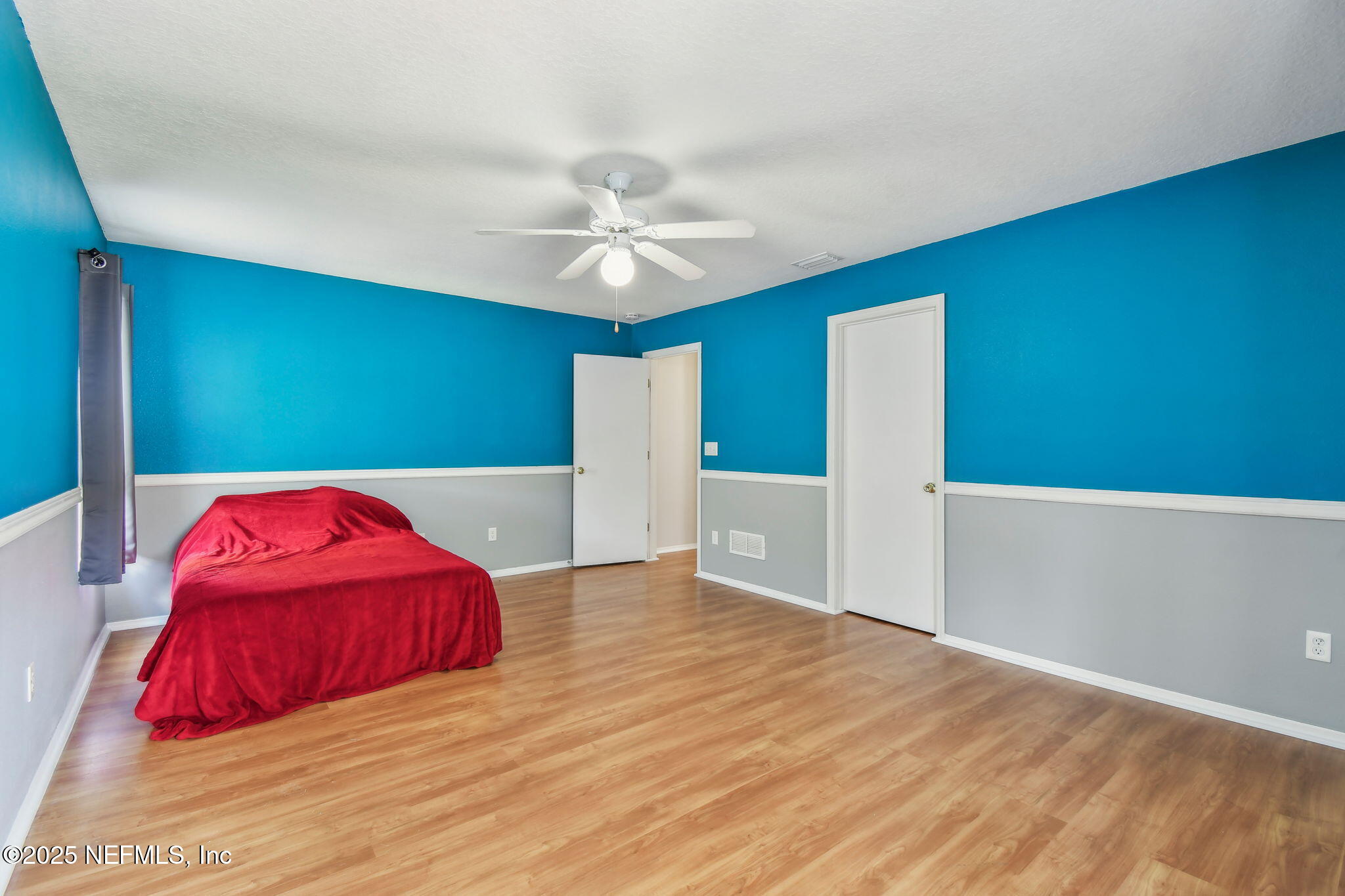 116 Nunna Rock Trail St. Augustine, FL 32092 - Photo 24 of 111 a view of a livingroom with a sofa and a ceiling fan