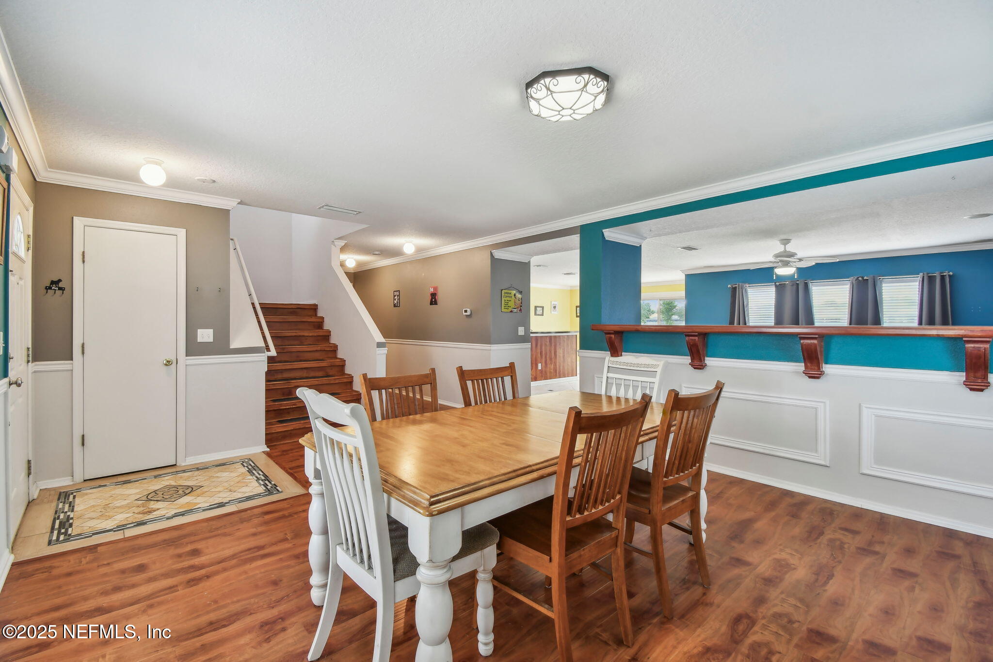 116 Nunna Rock Trail St. Augustine, FL 32092 - Photo 29 of 111 a dining room with furniture and wooden floor