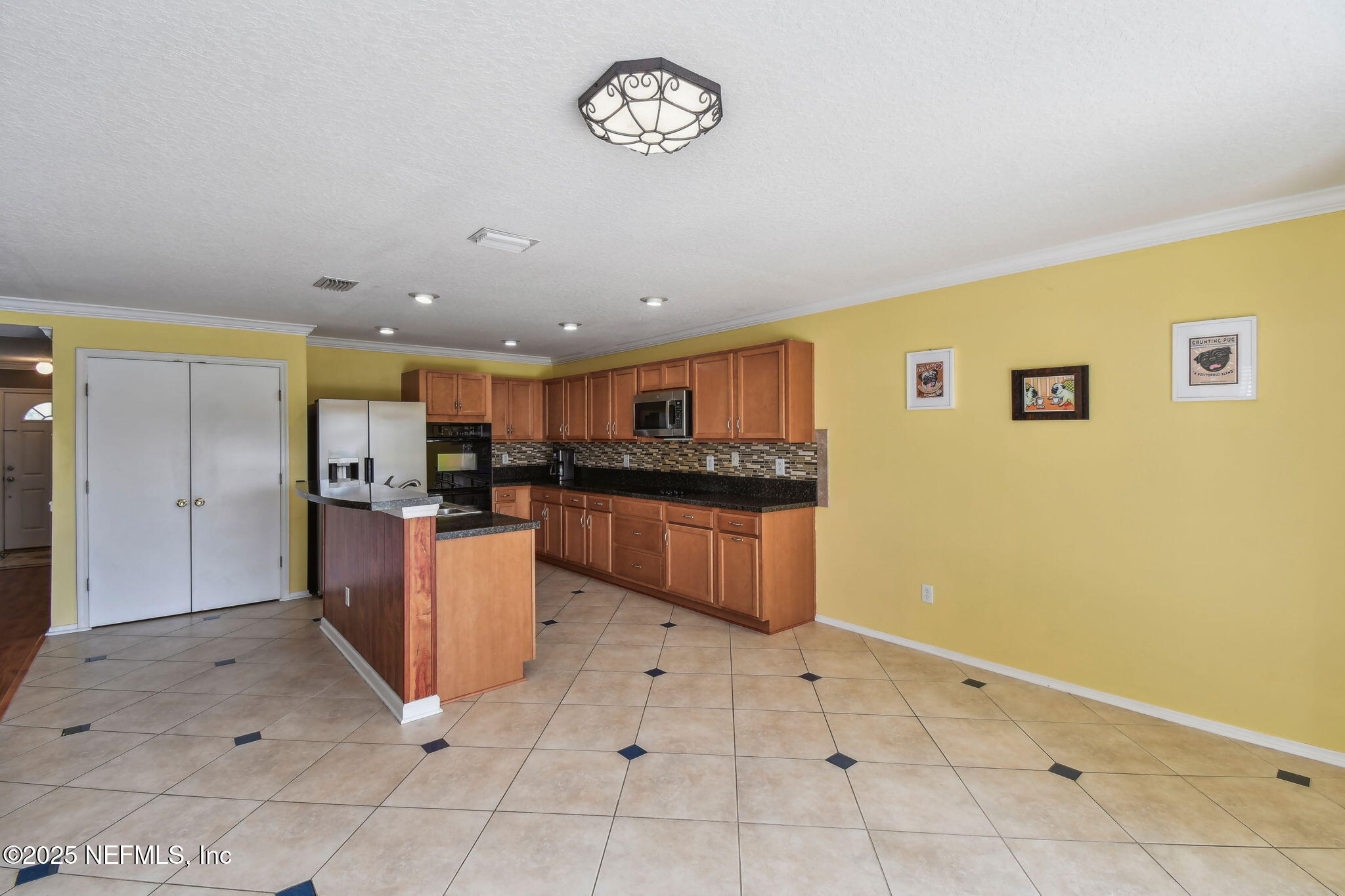 116 Nunna Rock Trail St. Augustine, FL 32092 - Photo 38 of 111 a open kitchen with a sink and cabinets