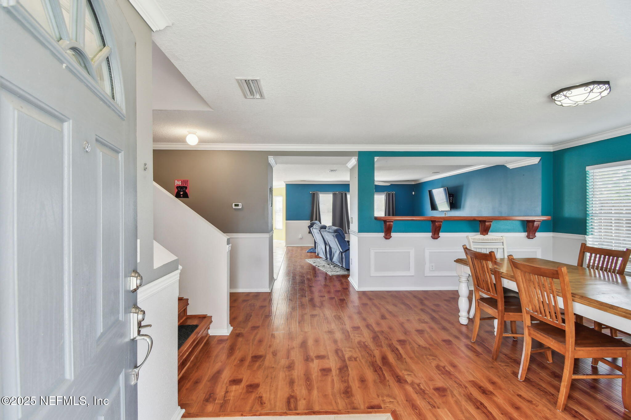 116 Nunna Rock Trail St. Augustine, FL 32092 - Photo 44 of 111 a living room with furniture and a wooden floor
