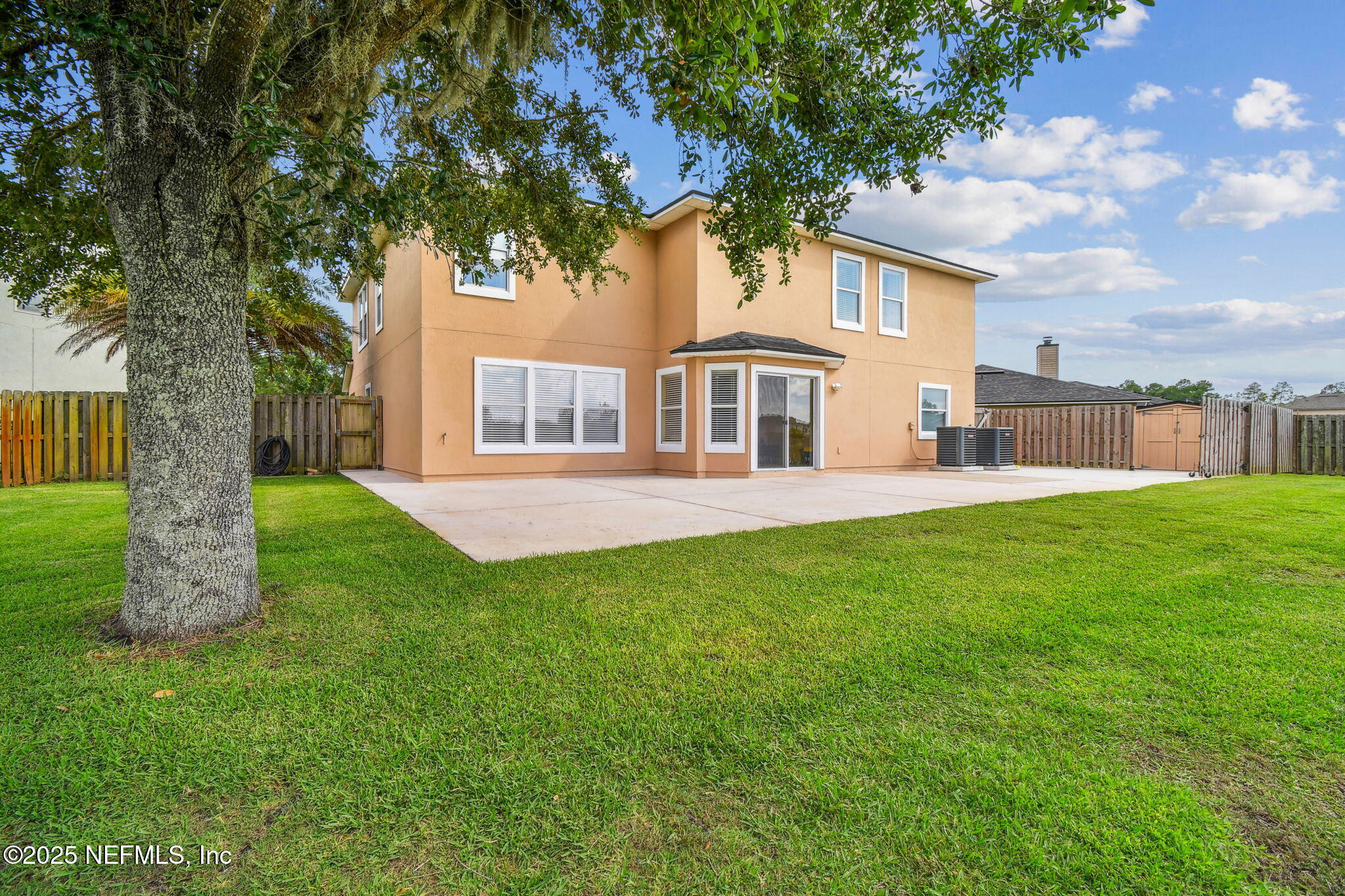 116 Nunna Rock Trail St. Augustine, FL 32092 - Photo 60 of 111 a front view of a house with a garden and yard