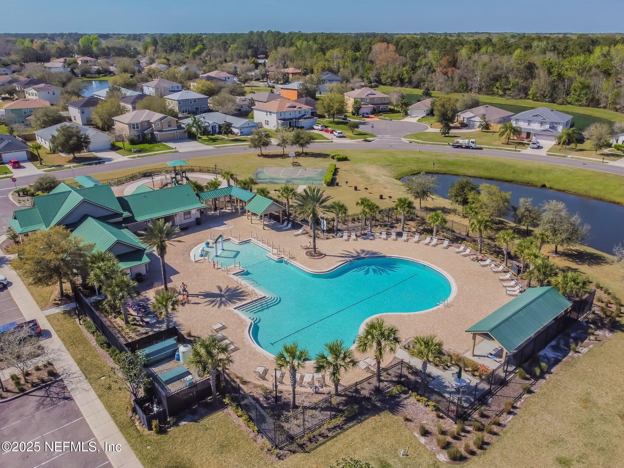 116 Nunna Rock Trail St. Augustine, FL 32092 - Photo 76 of 111 an aerial view of a house with a lake view