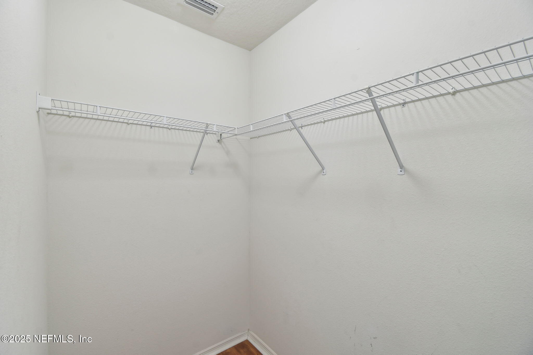 116 Nunna Rock Trail St. Augustine, FL 32092 - Photo 10 of 111 a view of a room with racks on the wall