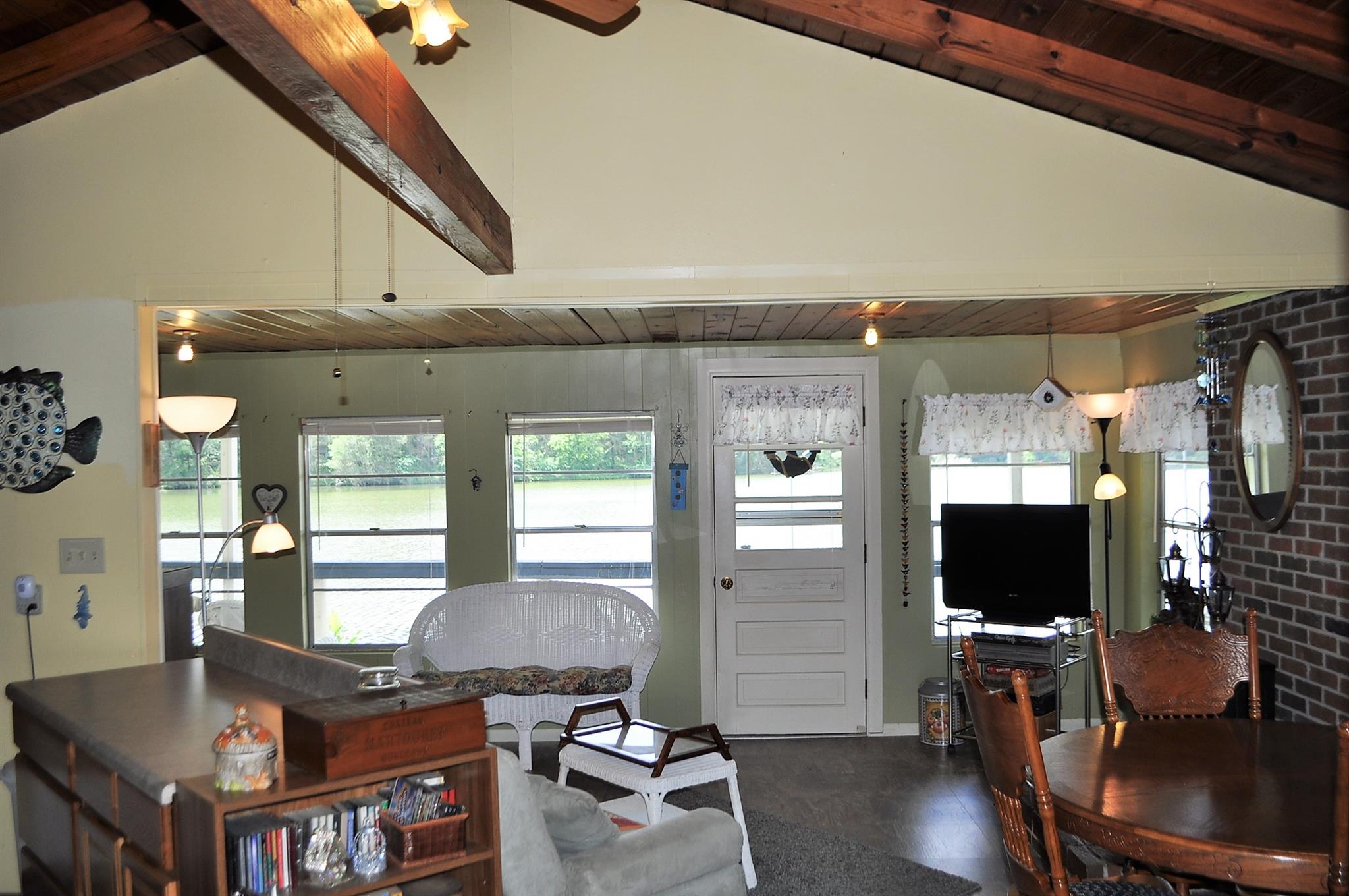 64 Lincoln Lake Road Kelso, TN 37348 - Photo 6 of 20 a living room with furniture and a flat screen tv