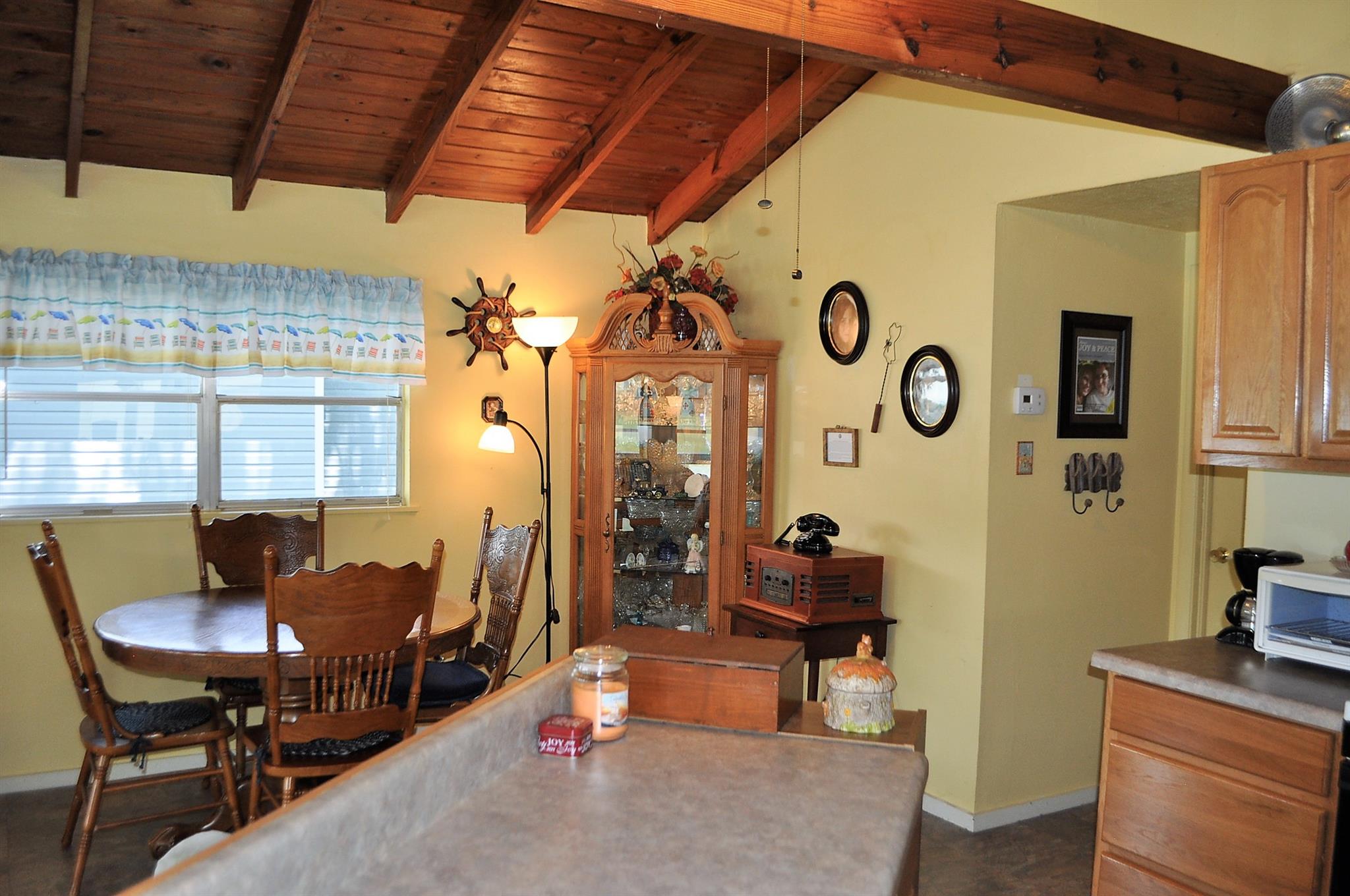 64 Lincoln Lake Road Kelso, TN 37348 - Photo 8 of 20 a dining room with furniture and window