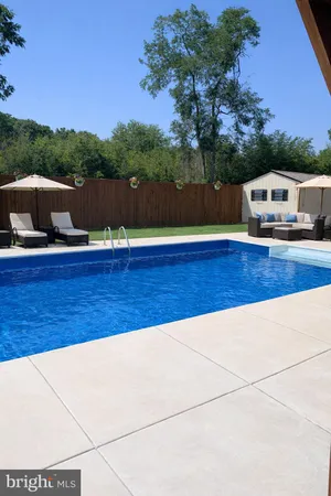 a view of swimming pool with mountain view