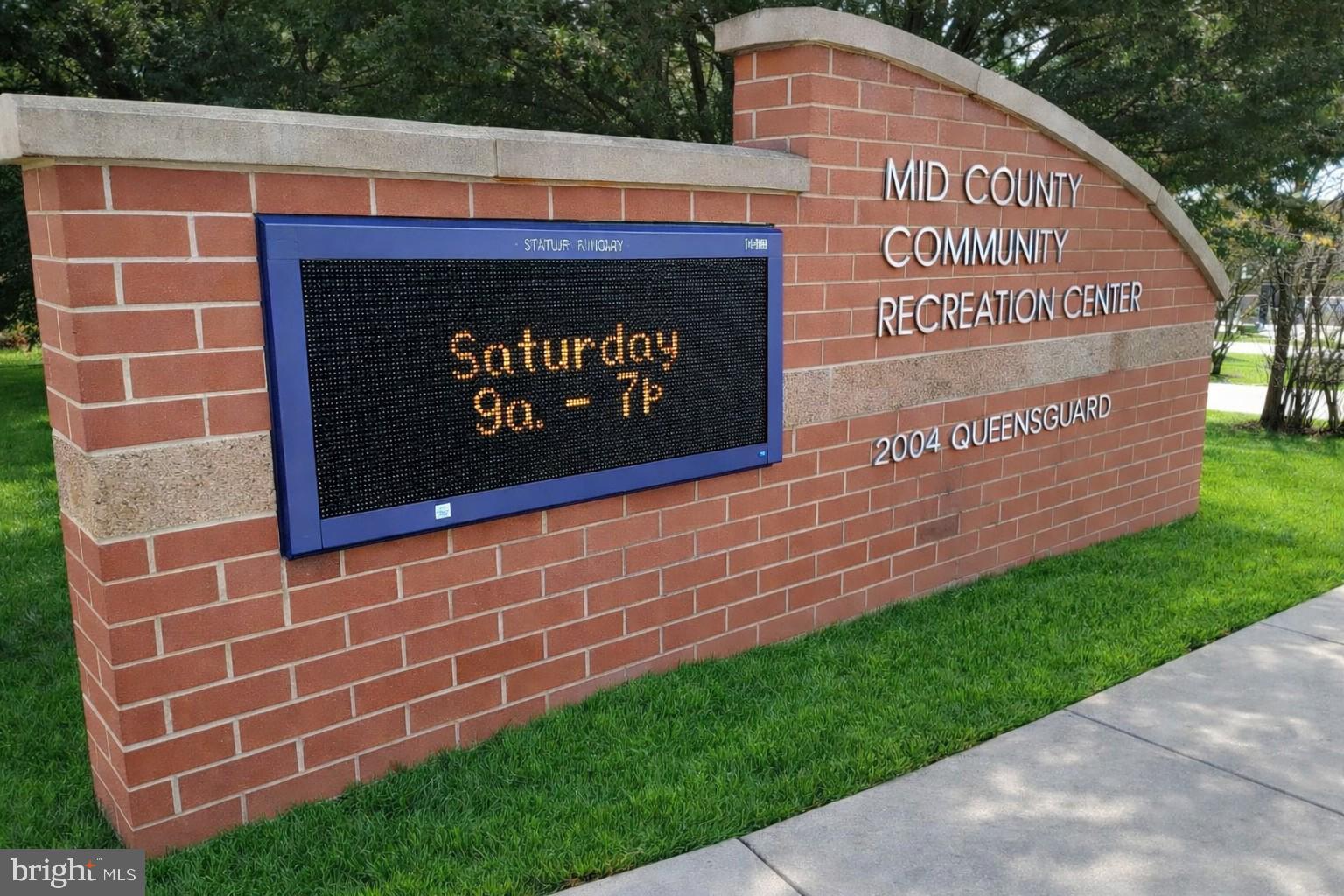 14216 Alderton Road Silver Spring, MD 20906 - Photo 9 of 14 a sign on the side of a building
