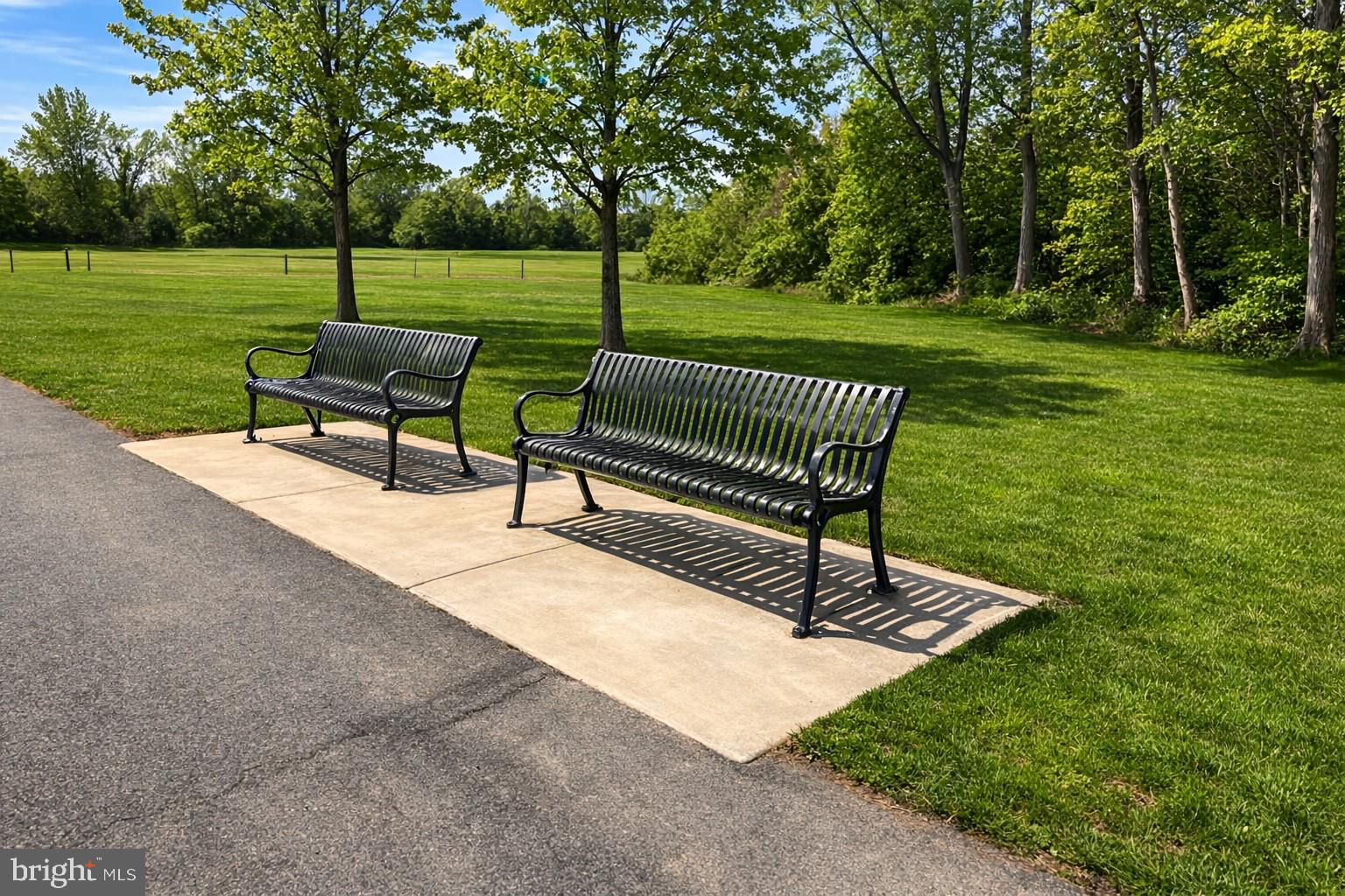 14216 Alderton Road Silver Spring, MD 20906 - Photo 10 of 14 a view of a bench in the garden near a lake