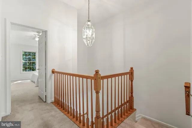 a view of a hallway with windows