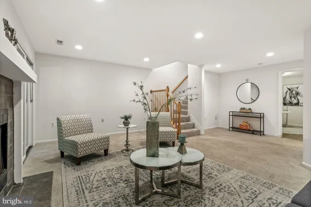a living room with furniture and a table