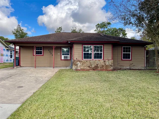 front view of a house with a patio