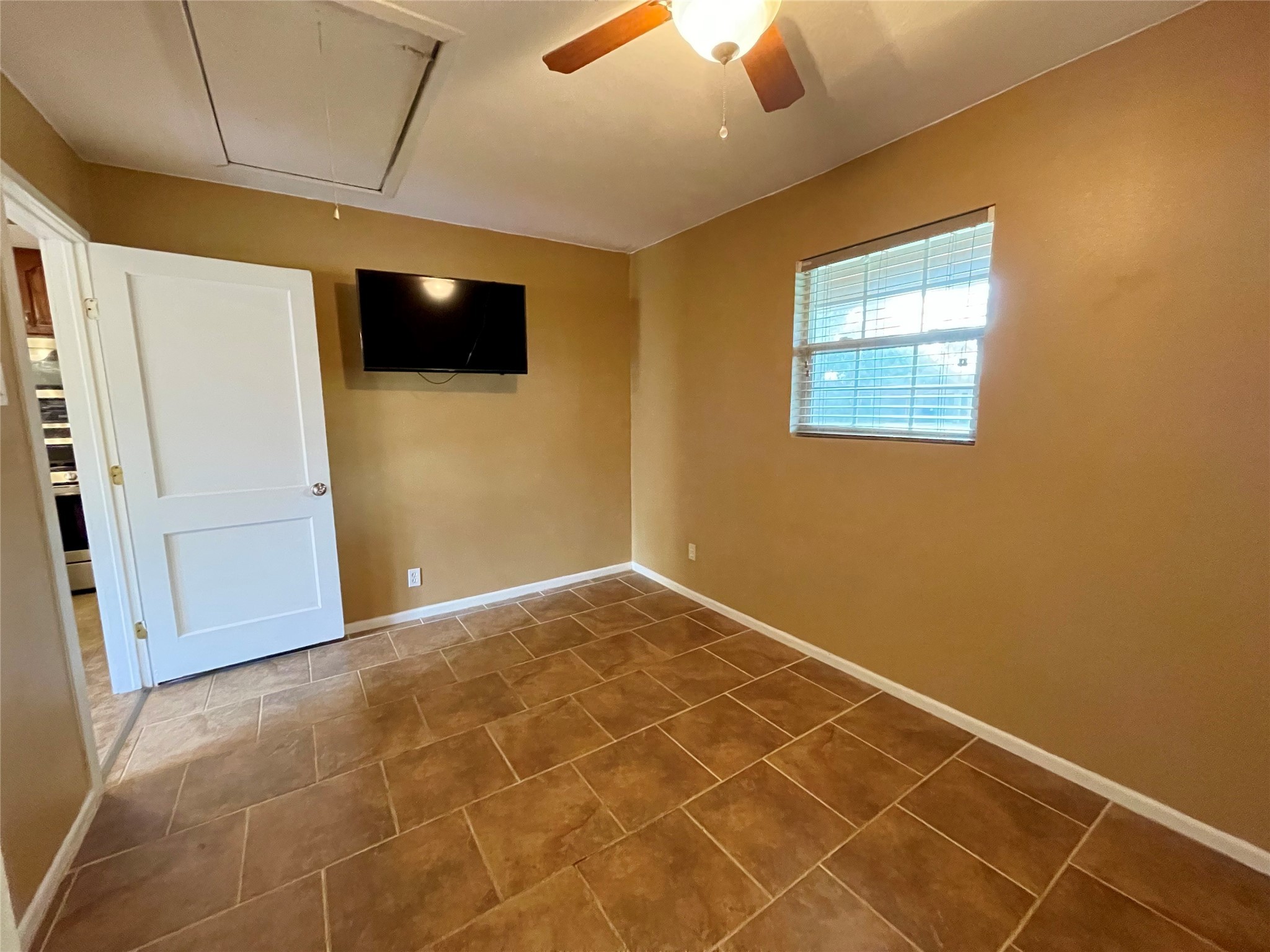 1113 Chevy Chase Drive Angleton, TX 77515 - Photo 14 of 32 a view of an empty room with a window