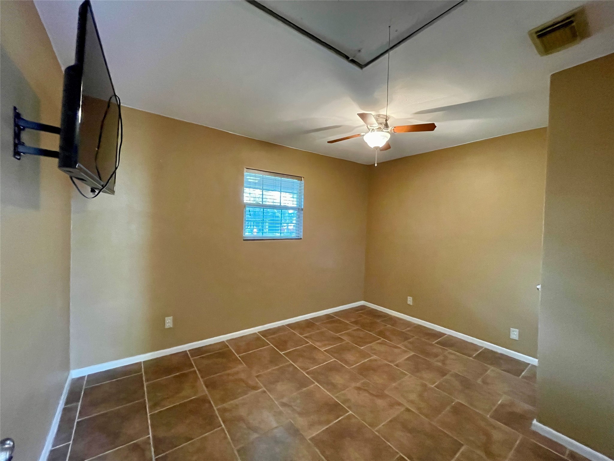 1113 Chevy Chase Drive Angleton, TX 77515 - Photo 15 of 32 Bedroom Three