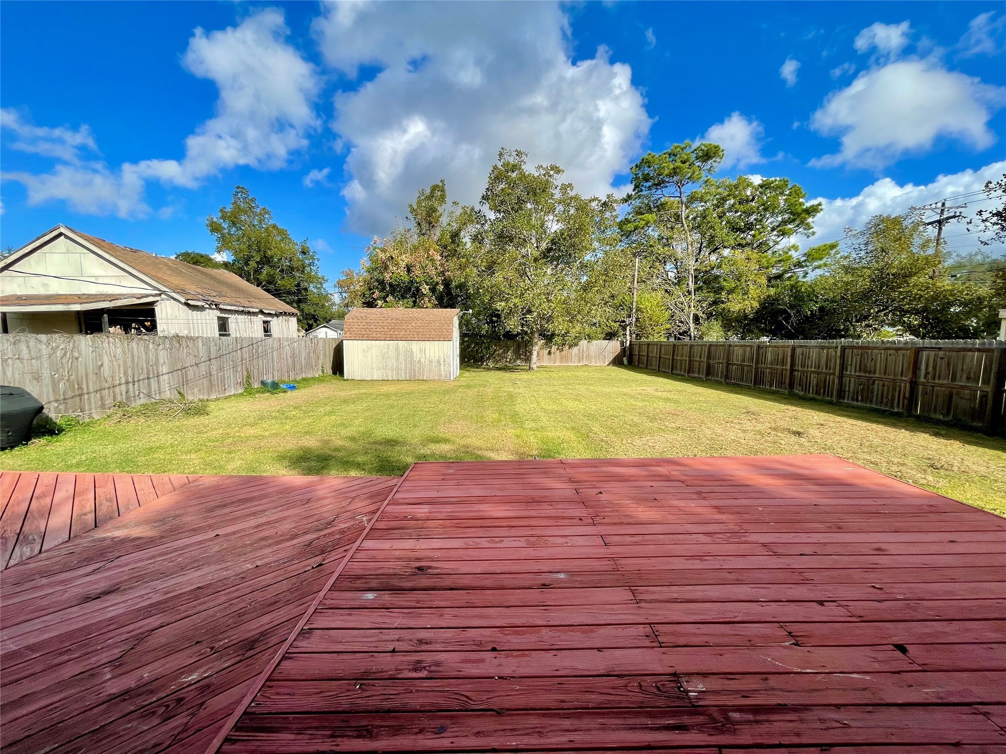 1113 Chevy Chase Drive Angleton, TX 77515 - Photo 29 of 32 Backyard Deck