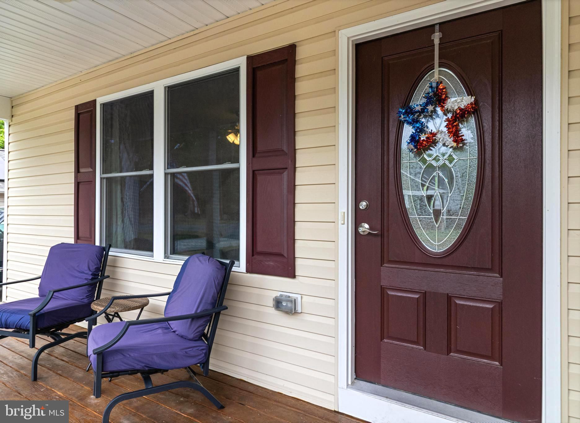 32 Placid Road Colonial Beach, VA 22443 - Photo 6 of 54 a front view of a house with entryway