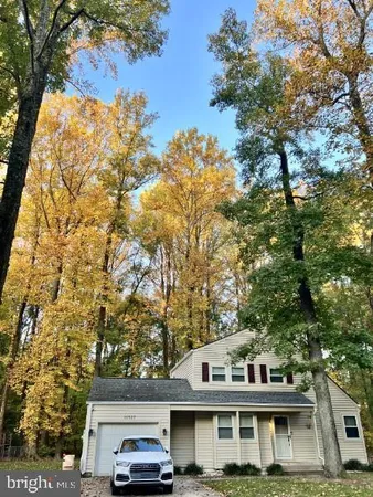 a view of balcony with furniture and trees