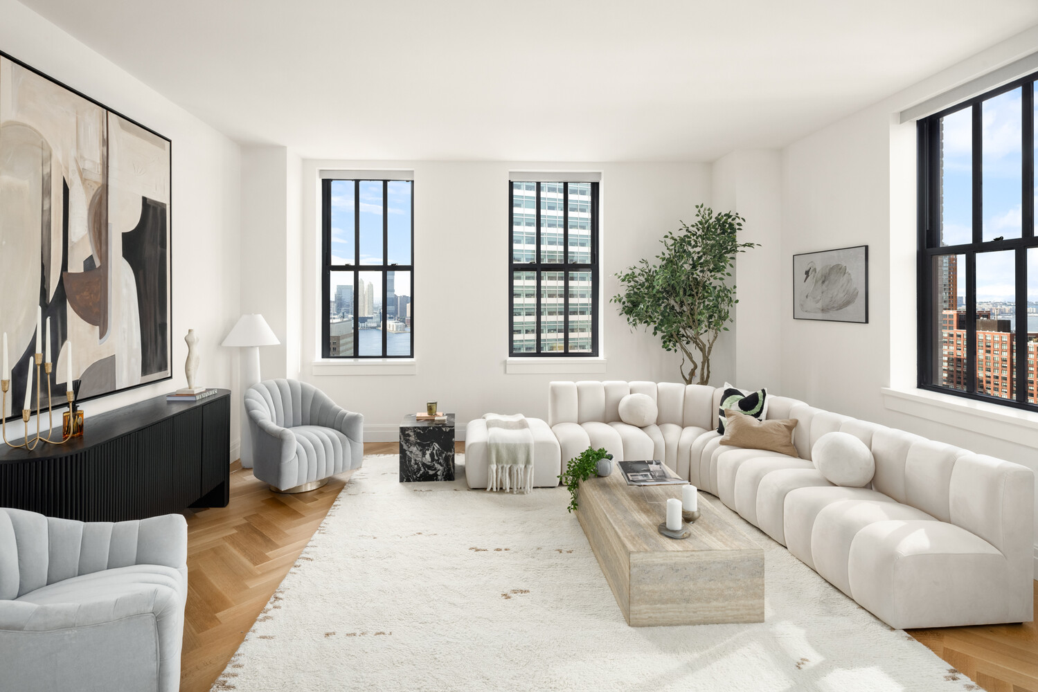 a living room with furniture fireplace and a window