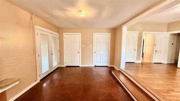 a view of a room with an entryway