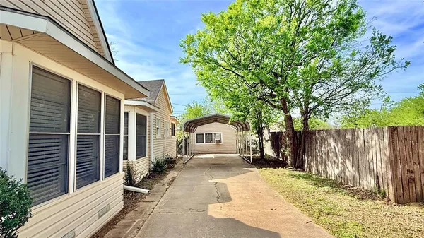 a front view of a house with a outdoor space