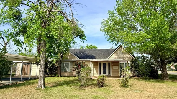 a view of a house with garden