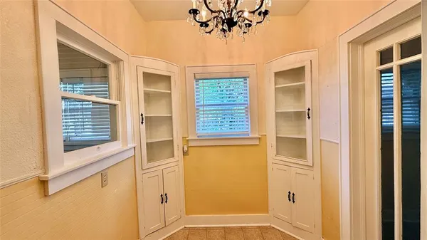 a view of walk in closet with window