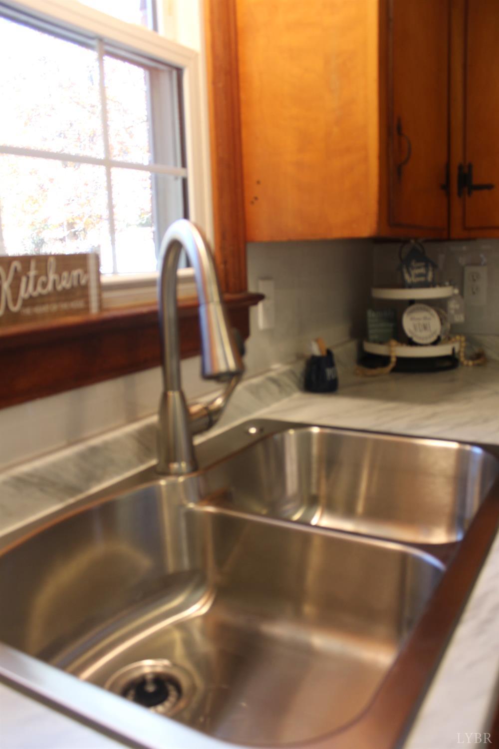 305 Eldon Road Appomattox, VA 24522 - Photo 23 of 24 a close view of sink and tap