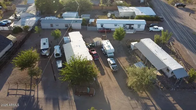 an aerial view of houses with outdoor space