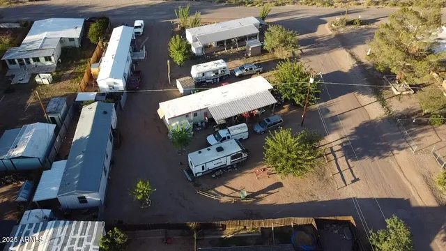 an aerial view of a balcony with chairs