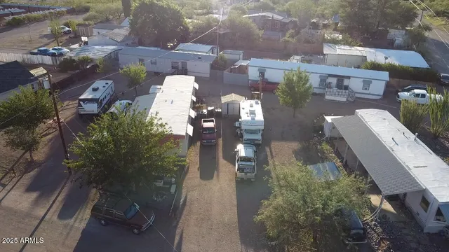an aerial view of houses with outdoor space
