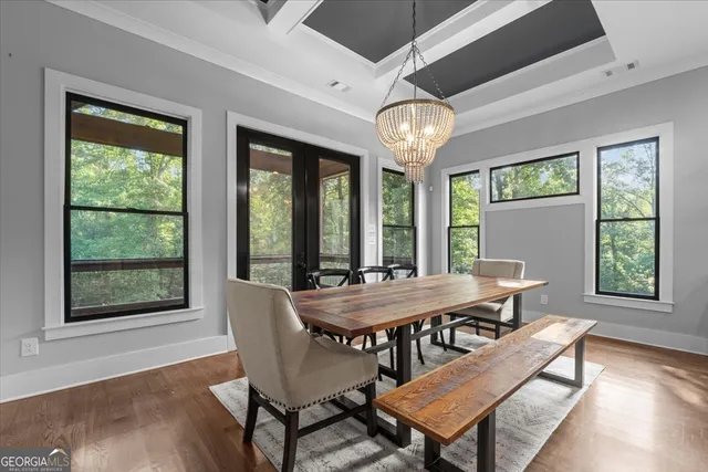 a view of a wooden deck with a yard