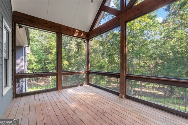 a kitchen with stainless steel appliances granite countertop a sink and a refrigerator