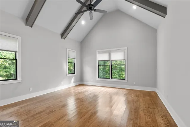 a bathroom with a double vanity sink and mirror