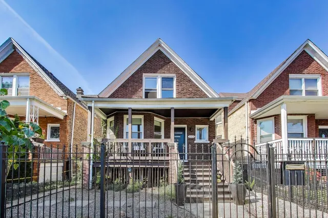 a front view of a house with balcony